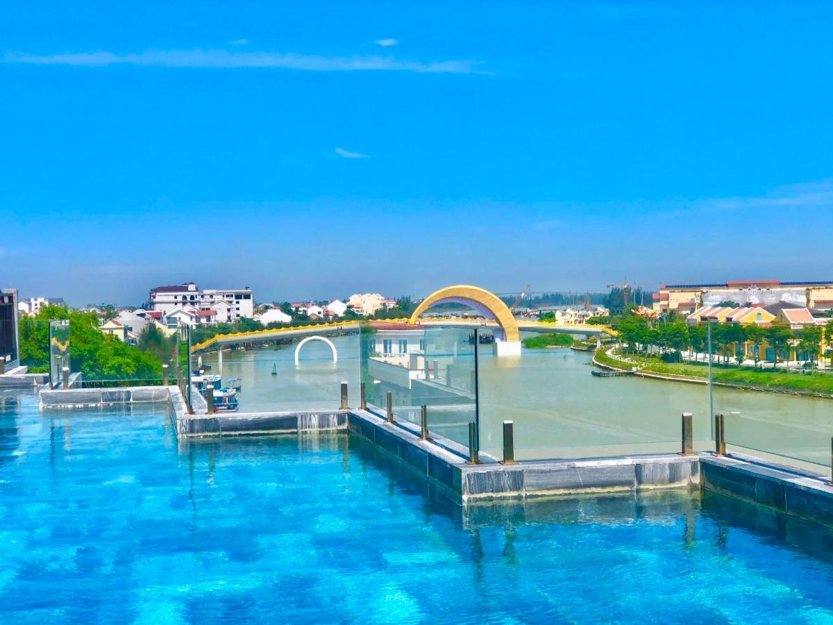 Little Riverside Hoi An . A Luxury Hotel & Spa Exteriér fotografie View of the bridge from the rooftop pool of the hotel